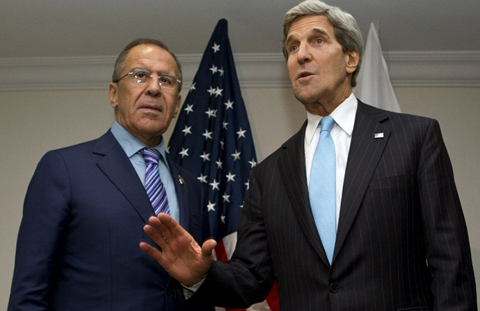 US Secretary of State John Kerry deflects a question from a reporter about whether he and Russian Foreign Minister Sergey Lavrov will discuss the fate of fugitive US secrets leaker Edward Snowden, before their meeting at the ASEAN summit in Brunei on July 2, 2013. (AFP Photo / Jaquelyn Martin)