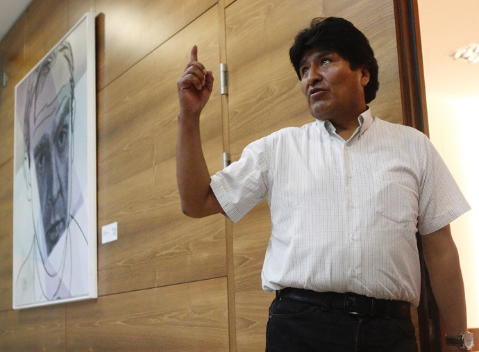 Bolivian President Evo Morales talks to the media as he waits for his flight at the Vienna International Airport in Schwechat July 3, 2013. (Reuters)