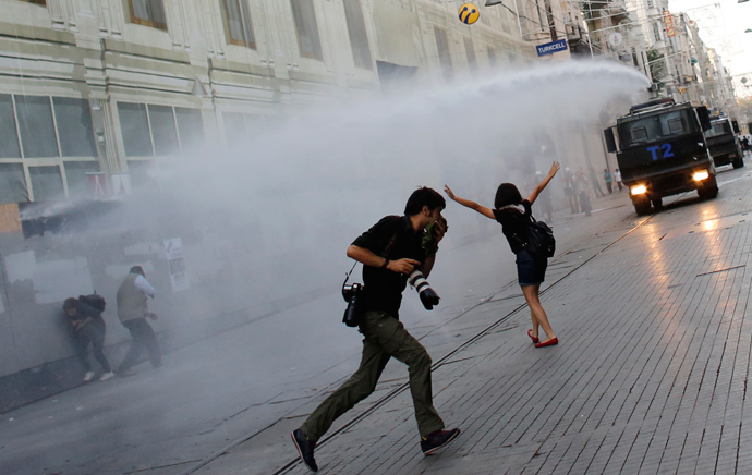 Riot police use a water cannon to disperse demonstrators during a protest in central Istanbul July 6, 2013 (Reuters / Murad Sezer)