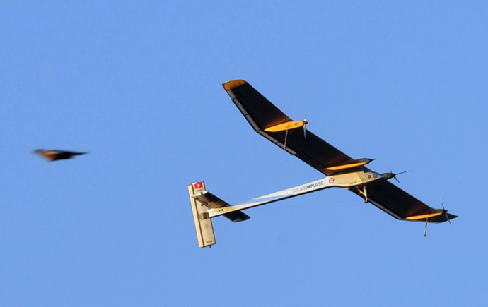 The Swiss-made solar-powered plane, Solar Impulse piloted by Bertrand Piccard, takes off from Toulouse-Francazal airport, off for Payerne in Switzerland, on July 24, 2012 (AFP Photo / Eric Cabanis)