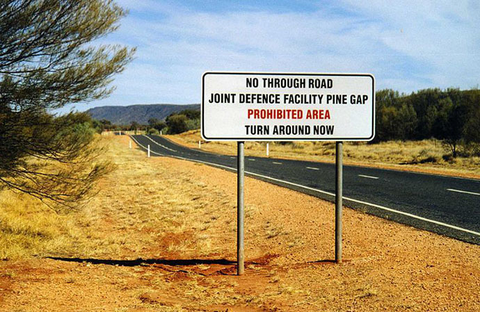 Warning sign on the road to Pine Gap (Image from wikipedia.org)