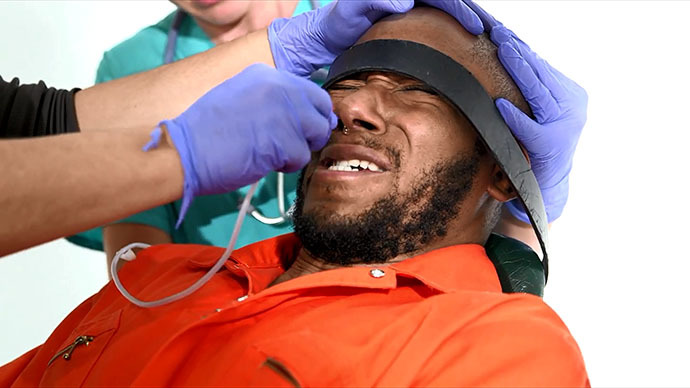 Rapper Mos Def Demonstrates What Hunger Strikers Go Through at Guantánamo  Bay