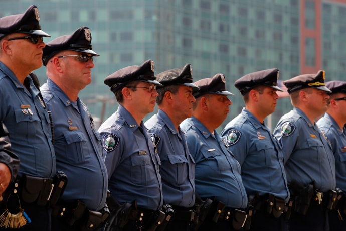 Massachusetts Institute of Technology (MIT) police officers stand outside the federal courthouse for the court appearance by accused Boston Marathon bomber Dzhokhar Tsarnaev in Boston, Massachusetts July 10, 2013 (Reuters / Brian Snyder)