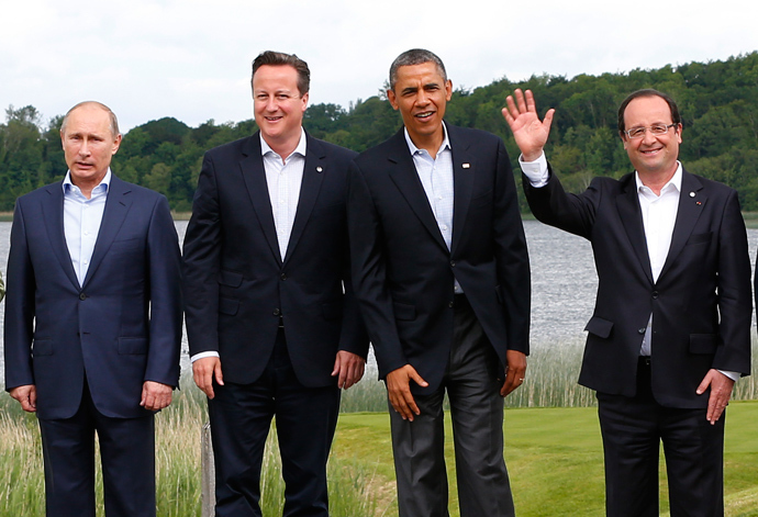Country leaders (L-R) Russia's President Valdimir Putin, Britain's Prime Minister David Cameron, U.S. President Barack Obama and France's President Francois Hollande attend a family photo at the G8 Summit, at Lough Erne, near Enniskillen, in Northern Ireland June 18, 2013 (Reuters / Yves Herman)