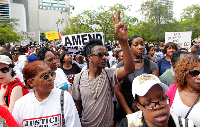 People attend a rally led by Tracy Martin, father of Trayvon Martin, in Miami, Florida July 20, 2013 (Reuters / Andrew Innerarity)