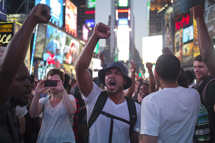 Activists demand justice for Trayvon Martin after marching to Times Square from New York's Union Square July 14, 2013. (Reuters / Adrees Latif)