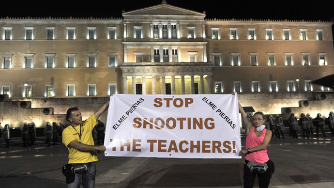 Austerity in action: Greece approves to lay off 25,000 teachers, police
