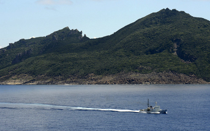 A Japan Coast Guard patrol ship sails around Uotsuri island, part of the disputed islands in the East China Sea, known as the Senkaku isles in Japan, Diaoyu islands in China (Reuters/Kyodo)