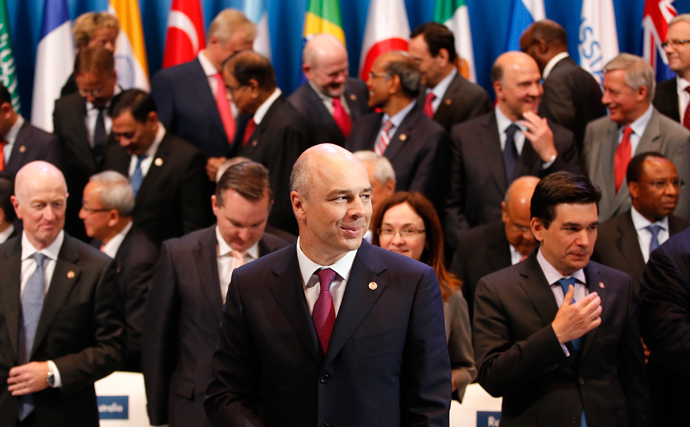 Russia's Finance Minister Anton Siluanov (front) participates in the G20 finance ministers and central bank governors' family photo in Moscow, July 20, 2013 (Reuters / Grigory Dukor) 