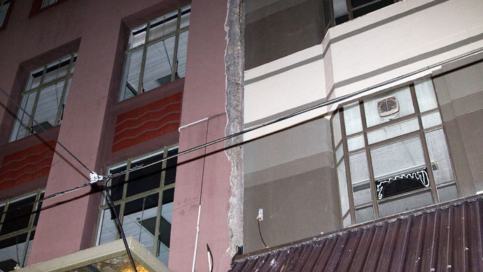 Debry from an old office building that were damaged is seen after a 6.5 magnitude earthquake hit Wellington on July 21, 2013.(AFP Photo / Marty Melville)