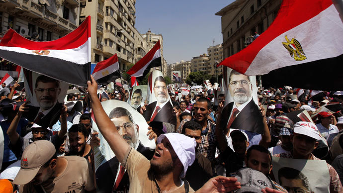 9 dead, dozens injured in clashes between pro- and anti-Morsi rallies in Cairo