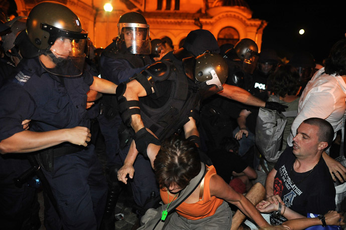 Bulgarian riot policemen push protestors during an anti-government protest in Sofia on July 23, 2013. (AFP Photo/Dimitar Dilkoff)