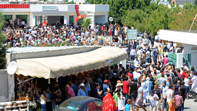 Thousands take to the streets after opposition leader gunned down in Tunisia