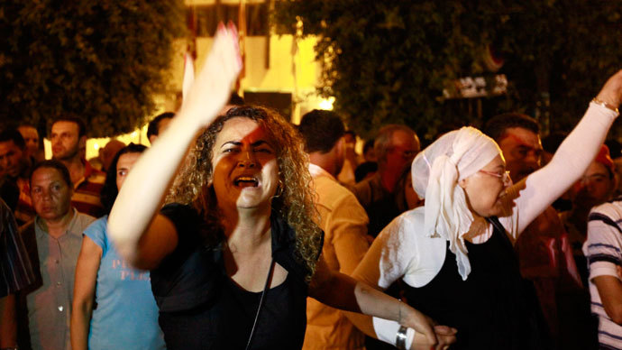Tunisians gather to protest the killing of opposition politician Mohamed Brahimi in Tunis, July 25, 2013.(Reuters / Anis Mili)