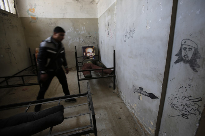 A Palestinian youth visits prison cells in Gaza City that had been used by Israeli security services to keep Palestinian prisoners during Israel's occupation of Gaza Strip (Reuters/Suhaib Salem)