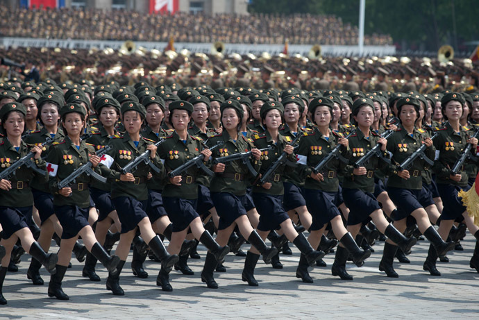 North Korean soldiers march during a military parade past Kim Il-Sung square marking the 60th anniversary of the Korean war armistice in Pyongyang on July 27, 2013. (AFP Photo/Ed Jones)