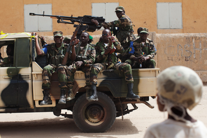 Malian soldiers patrol during Mali's presidential election in Timbuktu, Mali, July 28, 2013 (Reuters / Joe Penney)