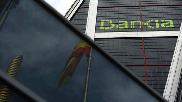 Spanish key lenders boast earnings turnaround, but bad debts still weigh