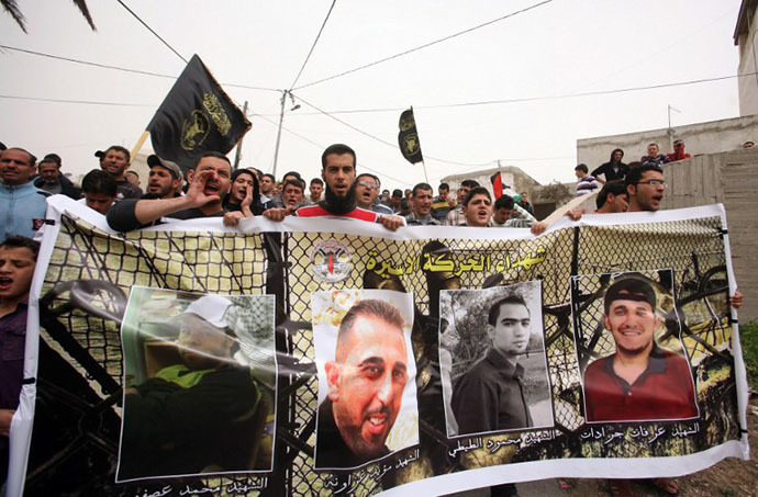 Palestinian protesters shout slogans in the northern West Bank village of Araba, near Jenin demanding the release Palestinian prisoners in Israeli jails. (AFP Photo / Saif Dahlan)