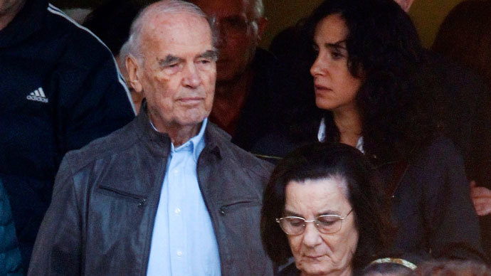 Convicted former Nazi SS captain Erich Priebke (L) leaves after attending a mass at a church in northern Rome October 17, 2010. Priebke, who is serving a life sentence under house arrest, celebrated his 100th birthday on July 29, 2013.(Reuters / Alessandro Bianchi)