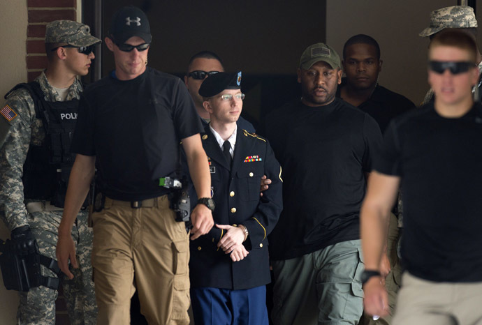 US Army Private First Class Bradley Manning leaves a military court facility after hearing his verdict in the trial at Fort Meade, Maryland on July 30, 2013. (AFP Photo/Saul Loeb)