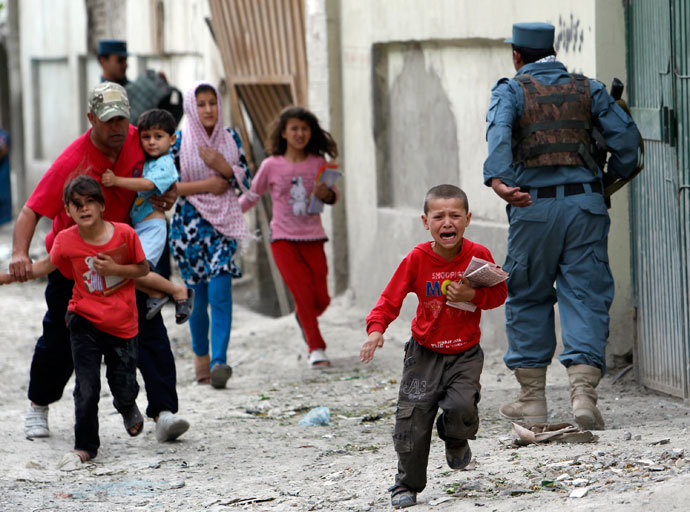 Children run away after an explosion in Kabul.(Reuters / Omar Sobhani)
