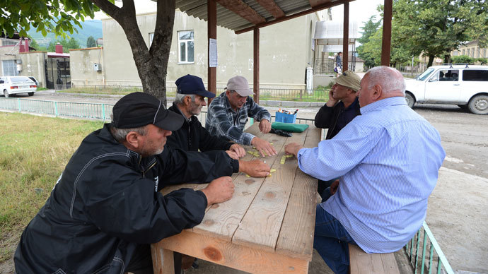 Local residents playing dominoes in the village of Leningor. (RIA Novosti / Mikhail Voskresenskiy)