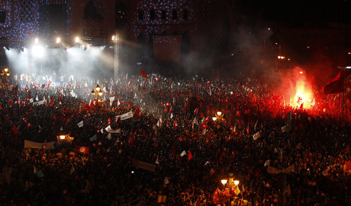 Supporters of the Islamist Ennahda movement attend a rally at Kasbah Square in Tunis August 3, 2013. (Reuters/Zoubeir Souissi)