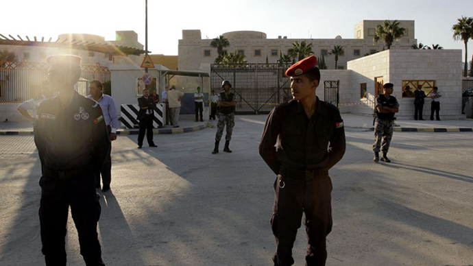 Jordanian policemen stand guard outside the US embassy in Amman on September 14, 2011 during a protest against the US policies in the Middle East (AFP Photo / Khalil Mazraawi)