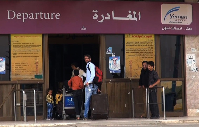 An image grab taken from an AFPTV video shows people entering the departure lounge at Sanaa International Airport as they prepare to leave Yemen on August 6, 2013 (AFP Photo / AFPTV)