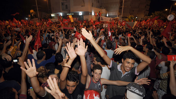 Tunisians chant slogans in front of the National Constituent Assembly on August 6, 2013 in Tunis.(AFP Photo / Fethi Belaid)