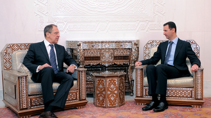 A handout picture released by the Syrian Arab News Agency (SANA) shows Syria's President Bashar al-Assad (R) meeting with Russian Foreign Minister Sergei Lavrov at the presidential palace in Damascus, on February 7, 2012 (AFP Photo)