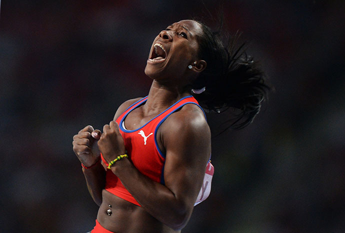 Cuba's Yarisley Silva celebrates after clearing the bar during the women's pole vault final at the 2013 IAAF World Championships at the Luzhniki stadium in Moscow on August 13, 2013 (RIA Novosti / Aleksei Filippov)