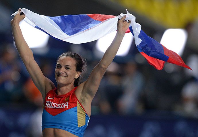 Russia's Elena Isinbayeva celebrates after winning the women's pole vault final at the 2013 IAAF World Championships at the Luzhniki stadium in Moscow on August 13, 2013. (RIA Novosti / Aleksei Filippov)