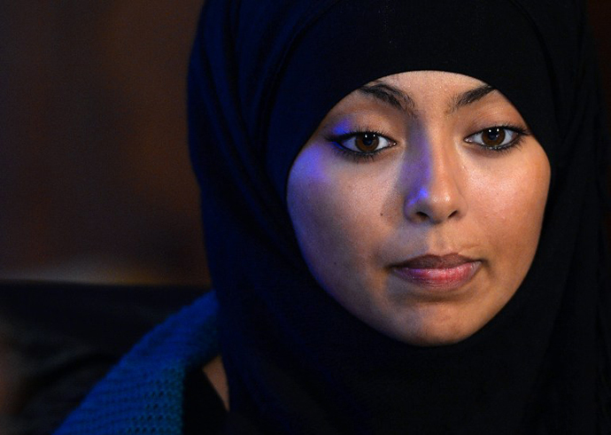 Rabia, 17, a veiled woman victim of agression in the street on May 20, speaks during a press conference on June 22, 2013 in Argenteuil, Paris suburb. (AFP Photo / Miguel Medina)