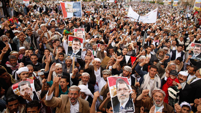 Supporters of Egypt's deposed Islamist President Mohamed Mursi shout slogans during a rally in protest of the recent violence in Egypt, in Sanaa August 16, 2013.(Reuters / Khaled Abdullah)