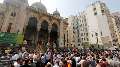 Egyptian Christians attacked, dozens of churches torched