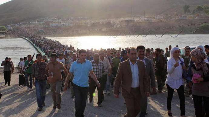 ‘Major exodus’: Thousands of Kurds flee Syria, seek shelter from atrocities in Iraq