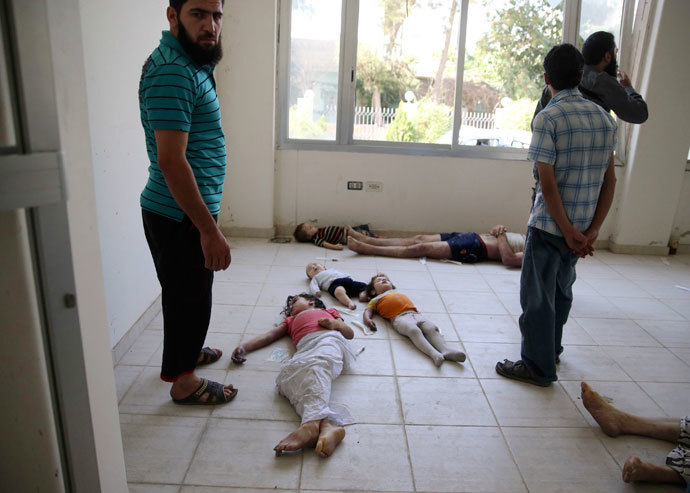 A view shows bodies of children whom activists say were killed by gas attack in the Ghouta area, in the eastern suburbs of Damascus August 21, 2013.(Reuters / Mohamed Abdullah)
