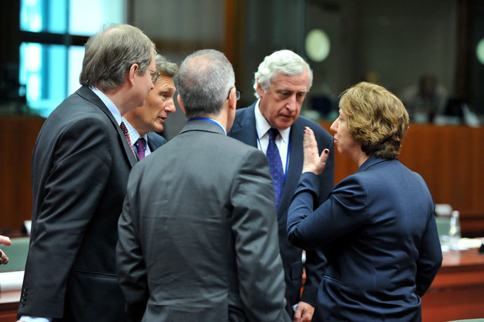 General Secretary for EU external Affairs Pierre Vimont (2nd R) and unidentified members of his staff talk with the High Representative of the European Union for Foreign Affairs and Security Policy Catherine Ashton (R) before an extraordinary EU Foreign Affairs Council on August 21,2013 at the European Headquarters.(AFP Photo / Georges Gobet)