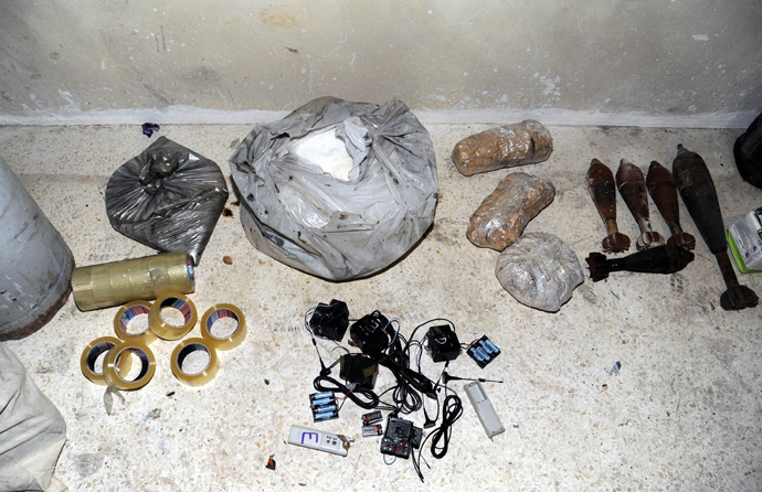 A handout picture released by the Syrian Arab News Agency (SANA) on August 24, 2013 shows bags of what the Syrian government claims to be materials used to make chemical weapons discovered in Jobar on the outskirts of the capital Damascus (AFP Photo)