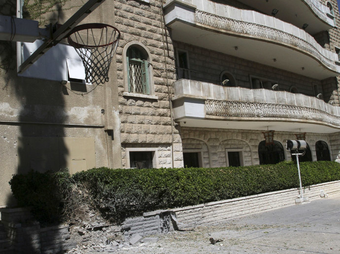 Damage is pictured inside the courtyard of the China embassy after a mortar shell hit the building, in Damascus September 30, 2013. (Reuters)