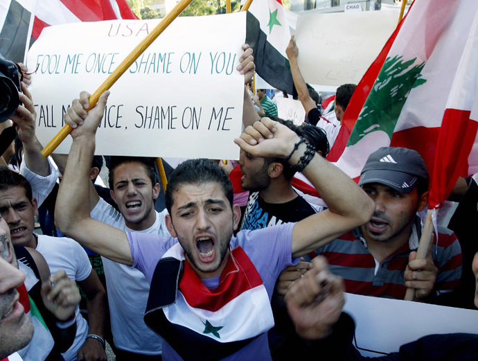 Lebanese supporters of Syrian regime, shout slogans during a demonstration near the US embassy, east of Beirut against a possible US military strike on Syria on September 7, 2013. (AFP Photo)