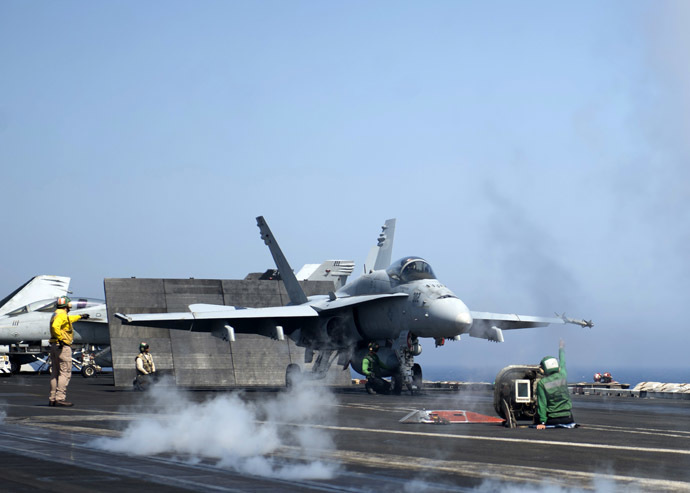 US Navy shows an F/A-18C Hornet assigned to the Rampagers of Strike Fighter Squadron (VFA) 83 preparing to launch from the flight deck of the aircraft carrier USS Dwight D. Eisenhower (CVN 69) on June 17, 2013 in the Mediterranean Sea. (AFP Photo)