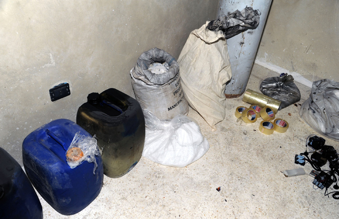 A handout picture released by the Syrian Arab News Agency (SANA) on August 24, 2013 shows bags and containers of what the Syrian government claims to be materials used to make chemical weapons discovered in Jobar on the outskirts of the capital Damascus (AFP Photo / HO / SANA)