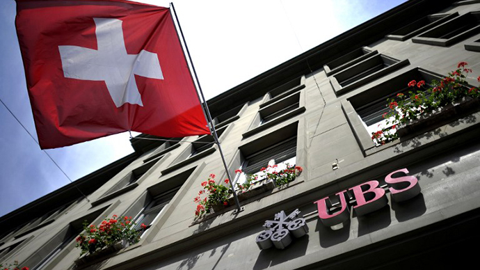 Swiss banks apologize for aiding tax cheats, set 2015 deadline for settlements