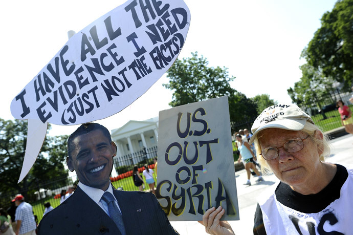 Anti-war demonstrators protest in front of the White House in Washington, DC, on September 2, 2013, against a possible US attack on Syria in response to possible use of chemical weapons by the Assad government. (AFP Photo/Jewel Samad)