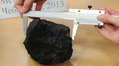 Huge half-ton chunk of Russian meteorite lifted from lakebed (VIDEO)