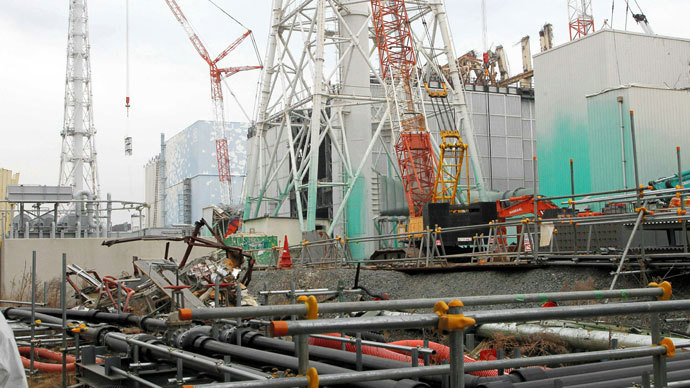 A general view shows unit three and unit two reactor building (light blue, L) of the Tokyo Electric Power Co (TEPCO) Fukushima Dai-Ichi nuclear power plant stands in Okuma Town, in Fukushima prefecture on March 1, 2013.(AFP Photo / Jiji Press)