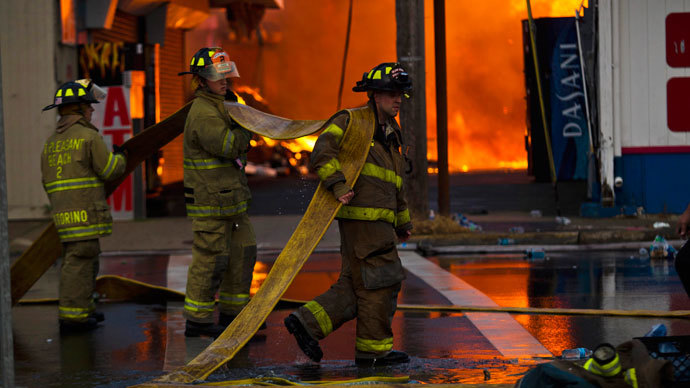 New Jersey firefighters arrive to control a massive fire in Seaside Park in New Jersey September 12, 2013. (Reuters / Eduardo Munoz)